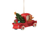 Grinch In Red Truck Ornament by Jim Shore